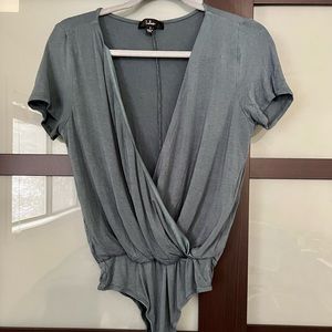 Low cut Lulu’s teal bodysuit
